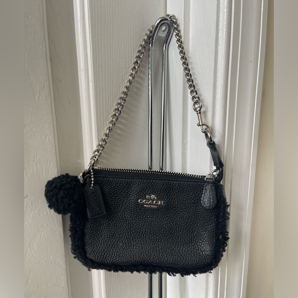 Coach black shearling trim pebbled leather wristlet GUC
